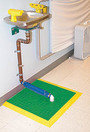 Tapis pour stations oculaires et douches d'urgence