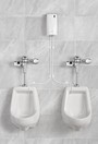 Système de nettoyage automatique pour toilettes Auto Janitor
