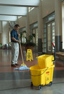 Panneau d'avertissement avec mention Wet Floor/Caution