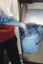 Scoop and wall holder for ice machines