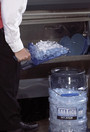 Scoop and wall holder for ice machines